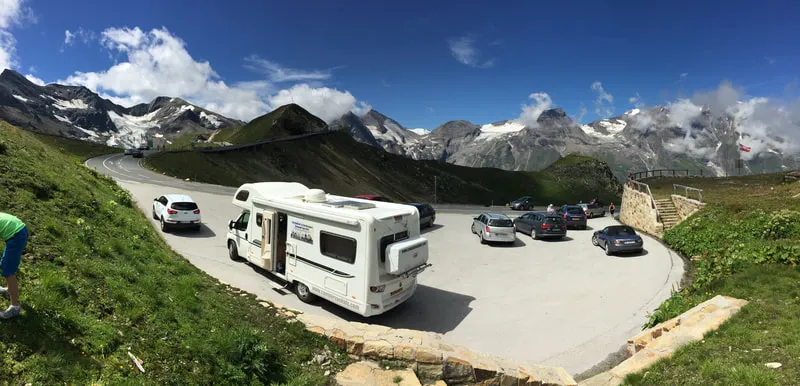 The motorhome on a hairpin bend in the Alps